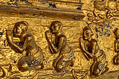 Luang Prabang, Laos - Wat Mai the gilded stucco engravings narrate the Vessantara Jataka, the penultimate rebirth as a human of the future Gotama Buddha. 